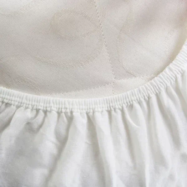 Непромокаемый наматрасник 180х200х25, ткань caress, цвет белый